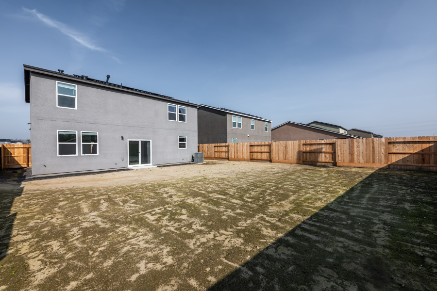 A house with a fence around it.