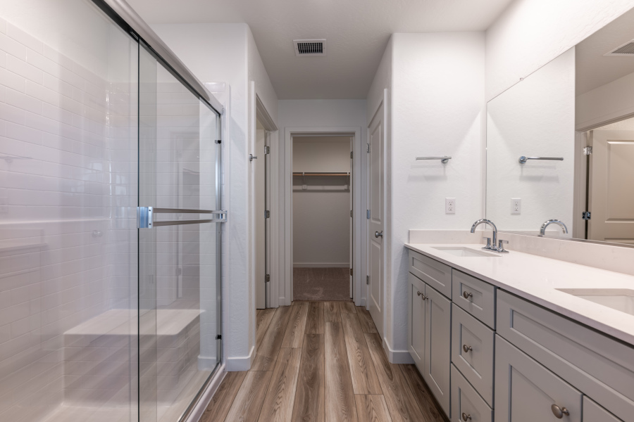 A bathroom with a glass shower.