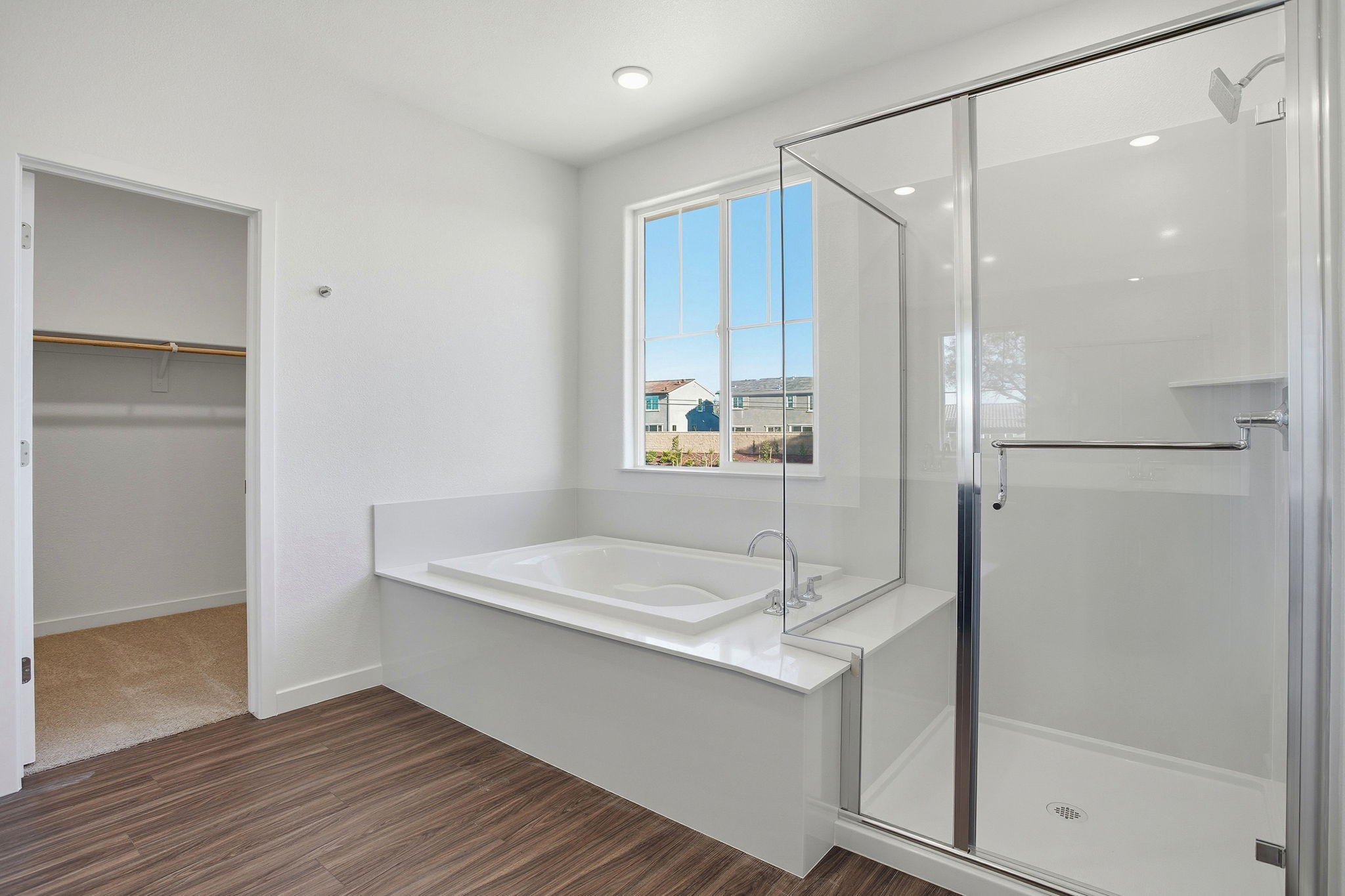 A bathroom with a glass shower.