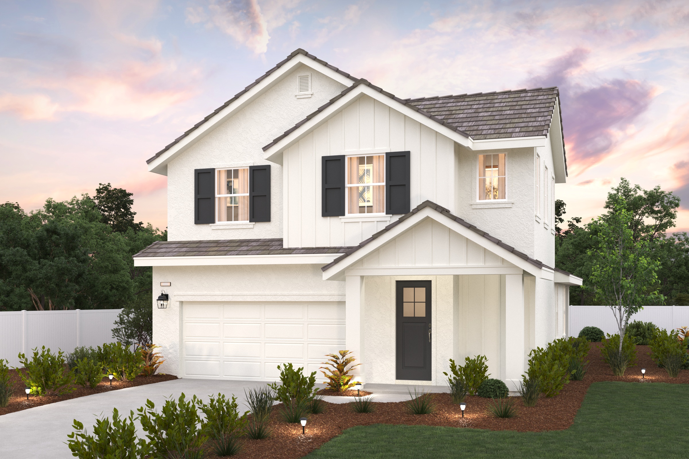 A white house with a driveway.