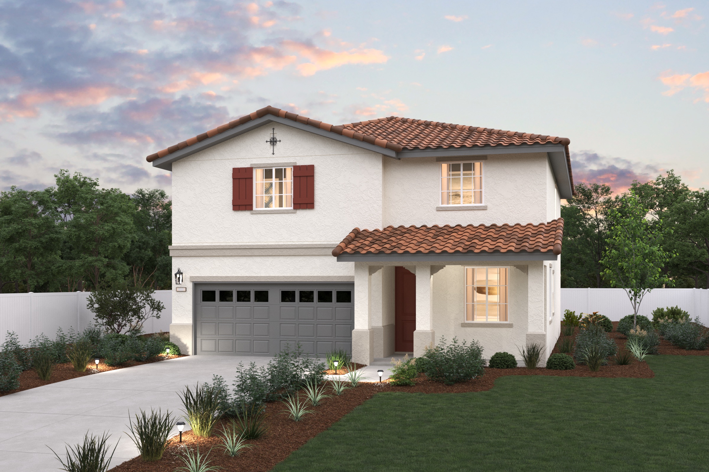 A house with a garage with Adamson House in the background.