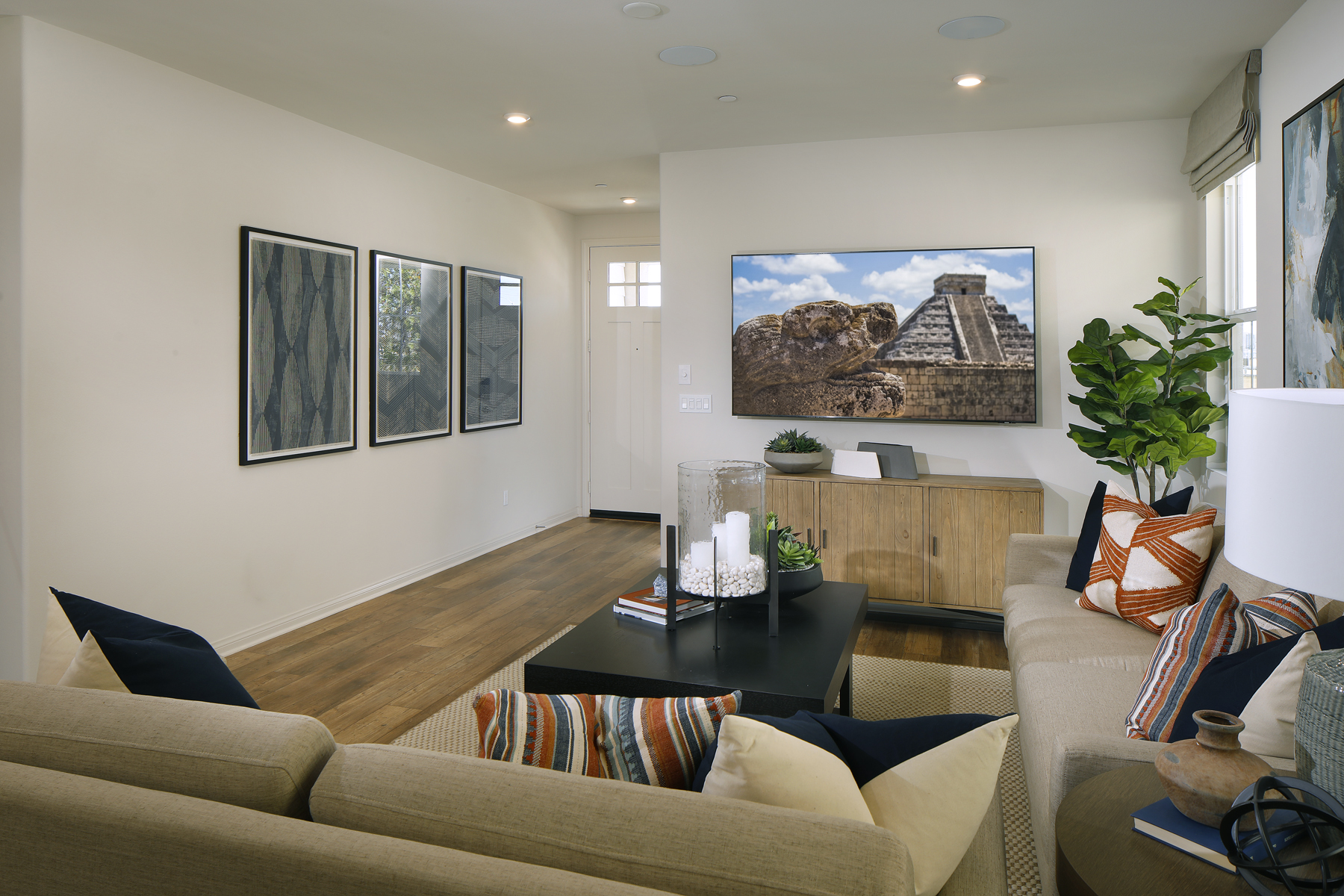 A living room with a couch and a coffee table.
