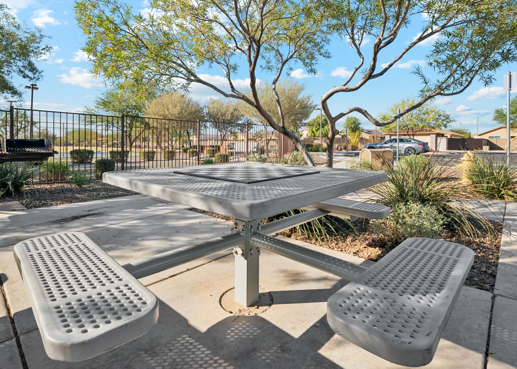 A table and chairs outside.