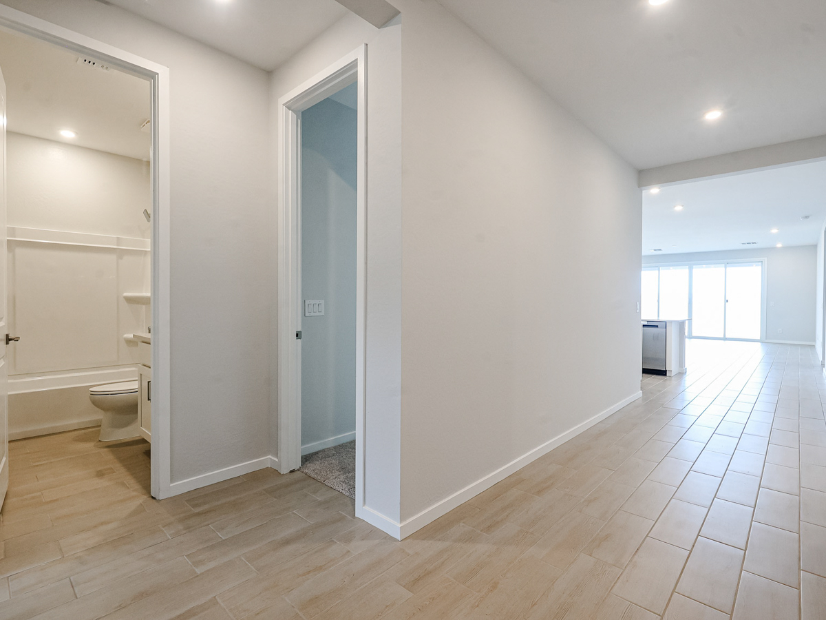 A bathroom with a toilet and shower.