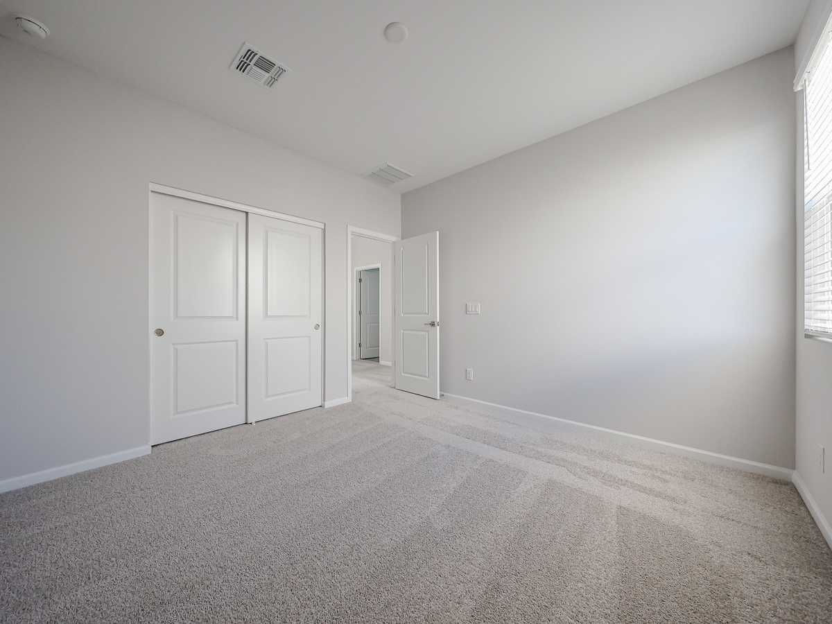 A room with white doors.