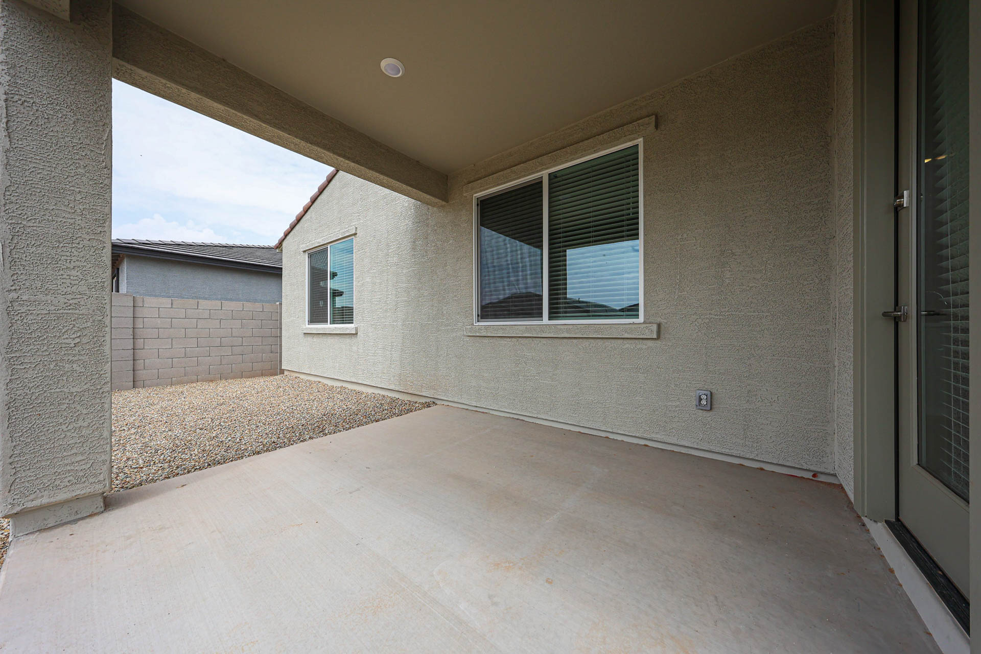 A room with a tile floor and a window.