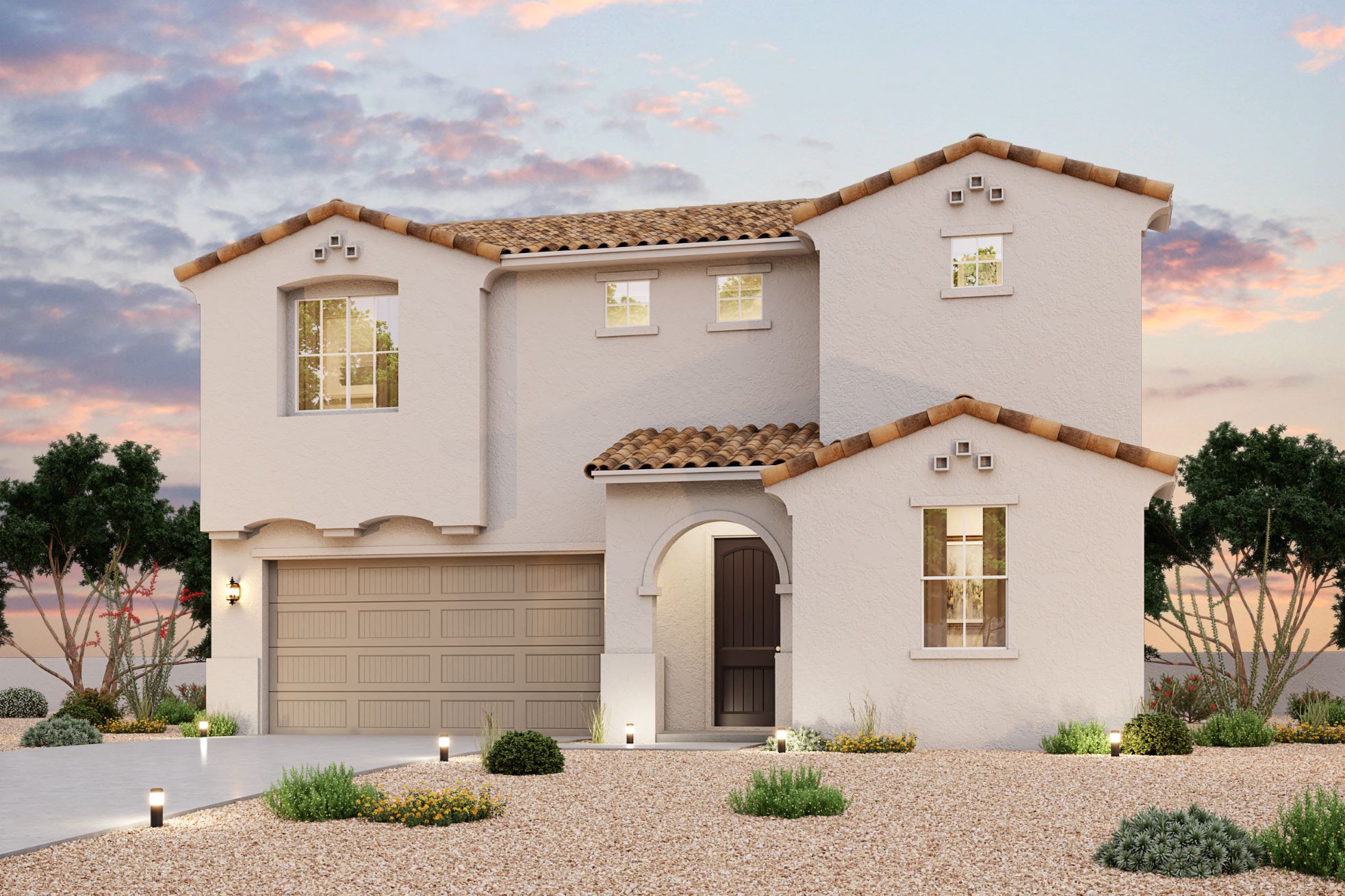 A white house with a garage.