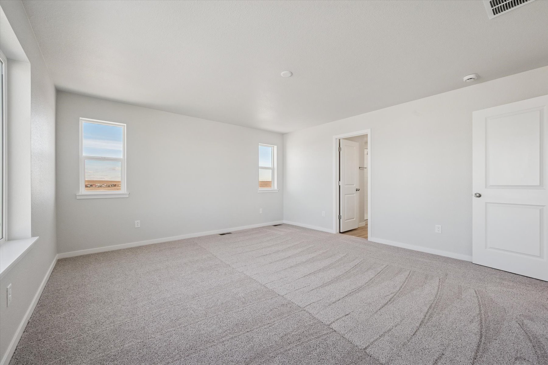 A room with white doors.
