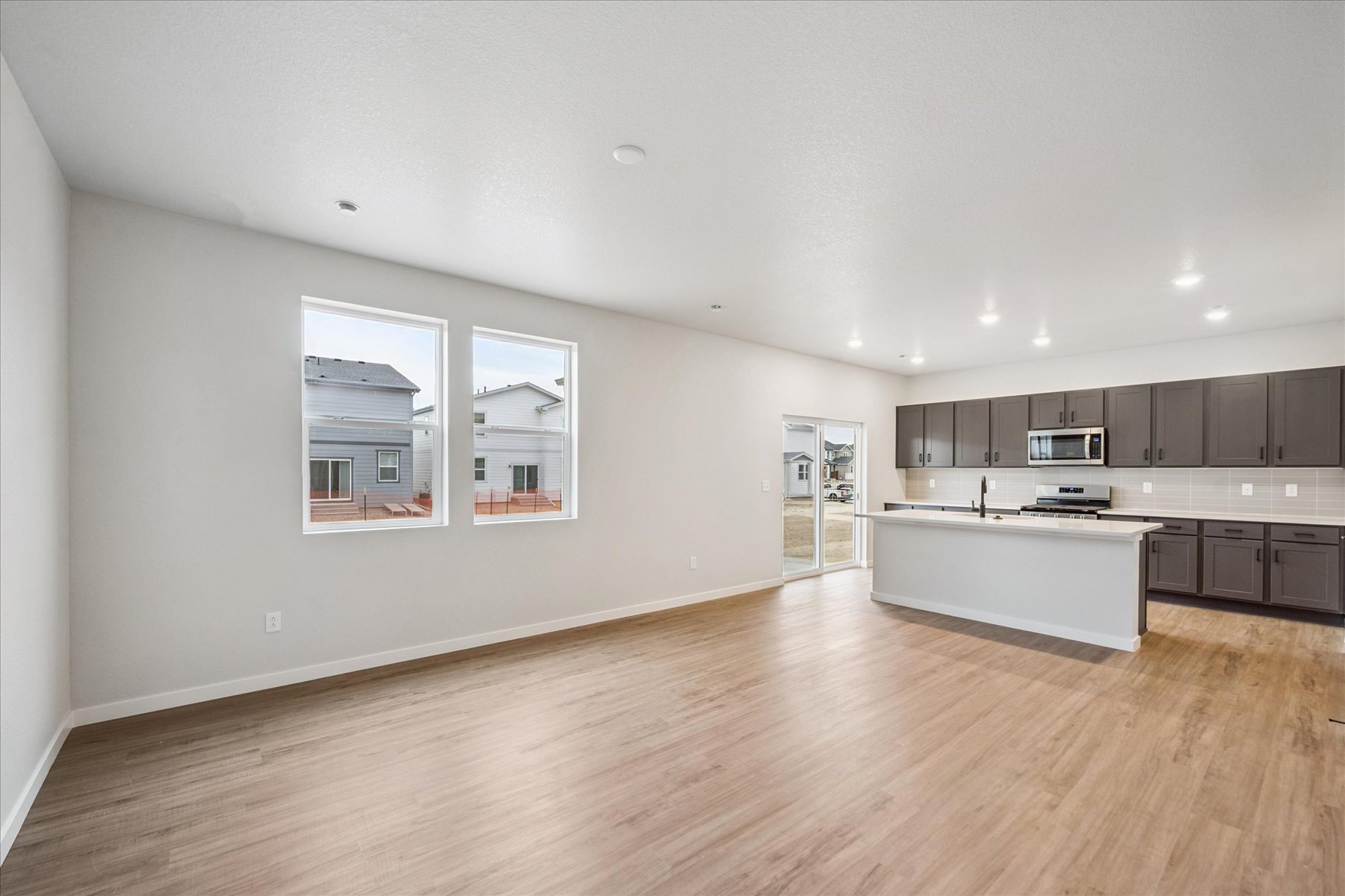 A kitchen with white walls.