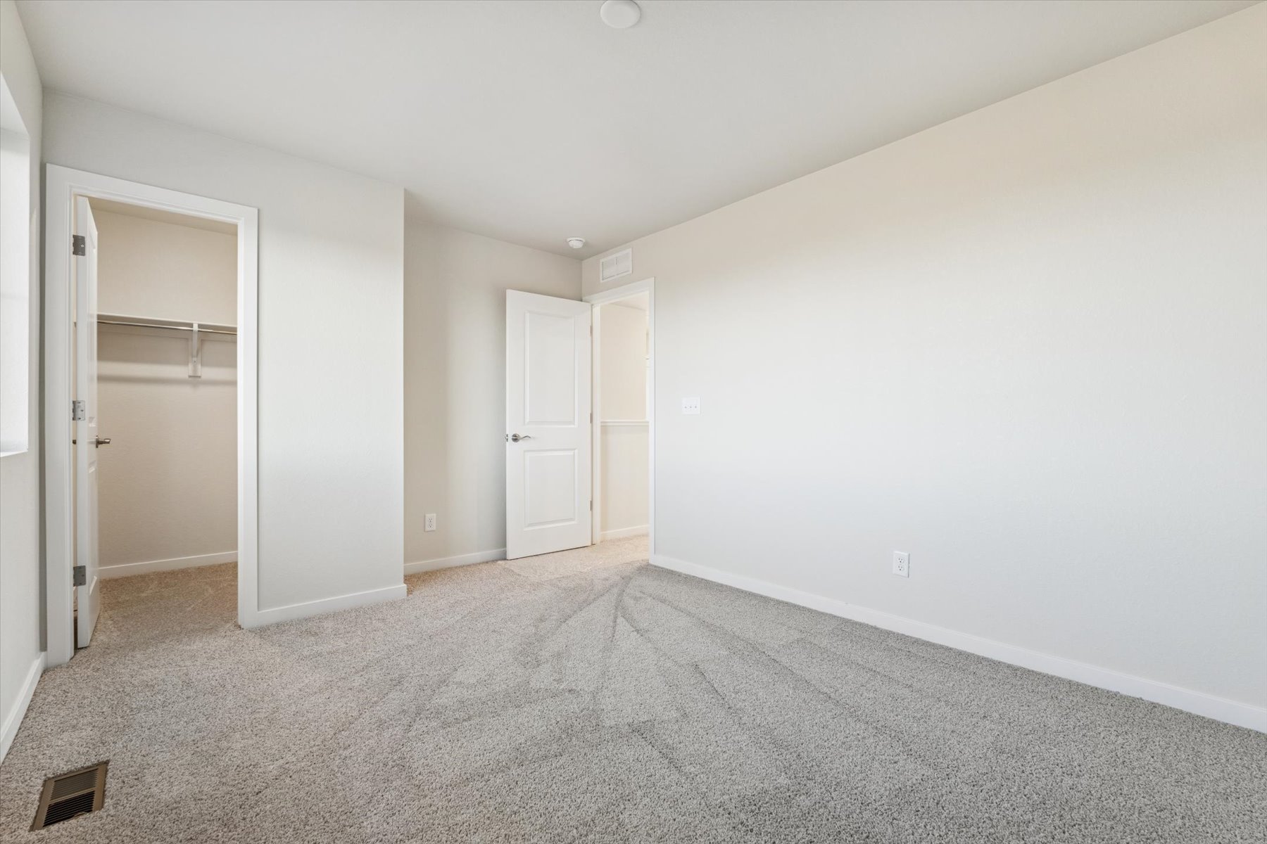 A room with white doors.