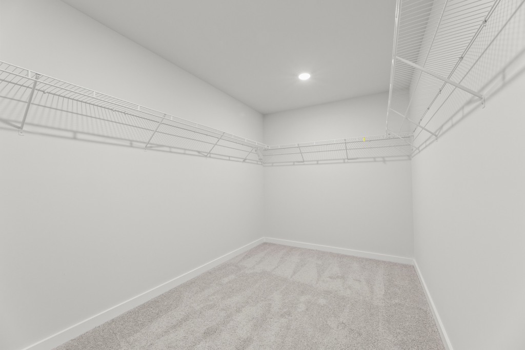 A white hallway with white walls.