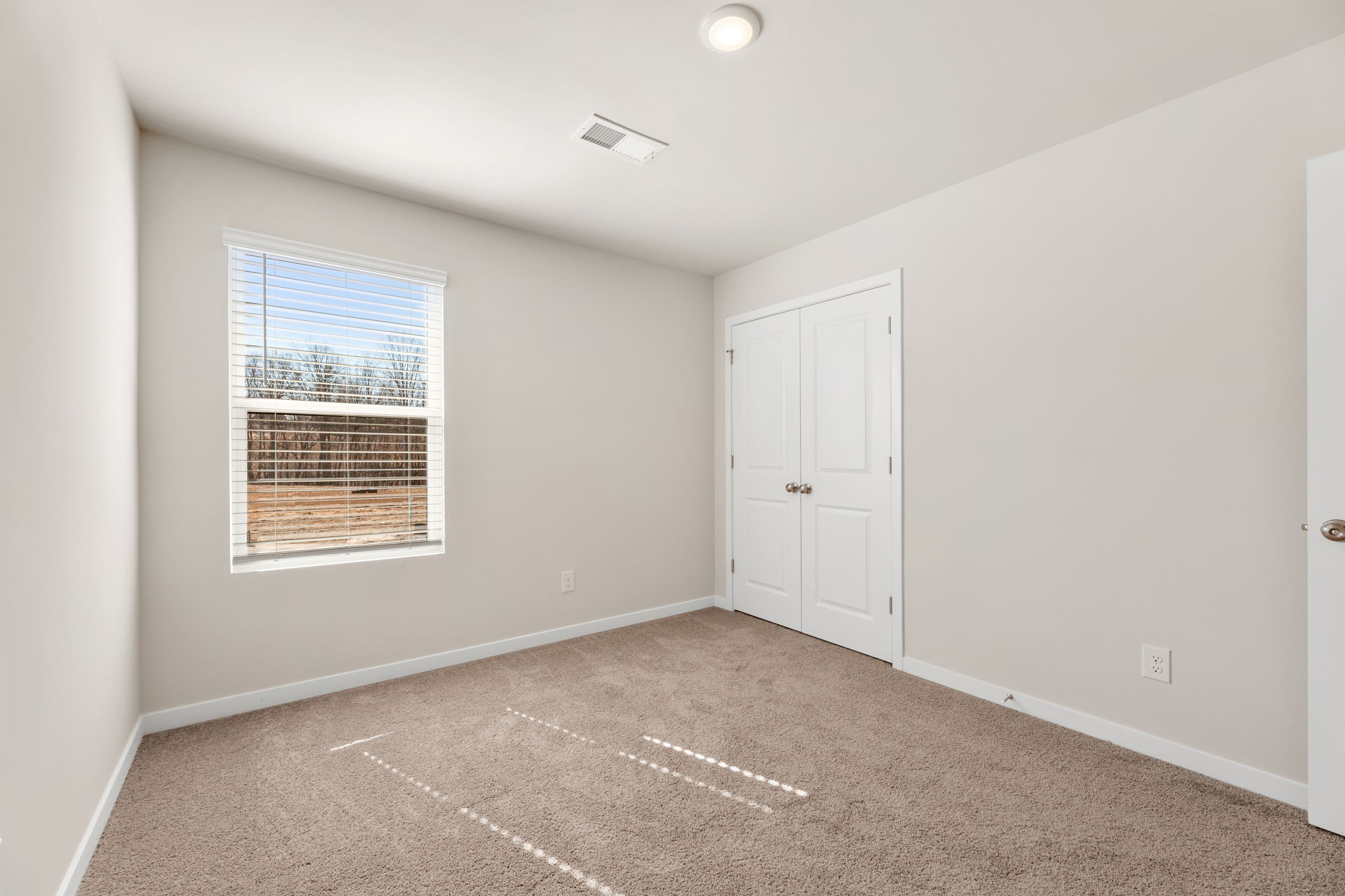 A room with white doors.