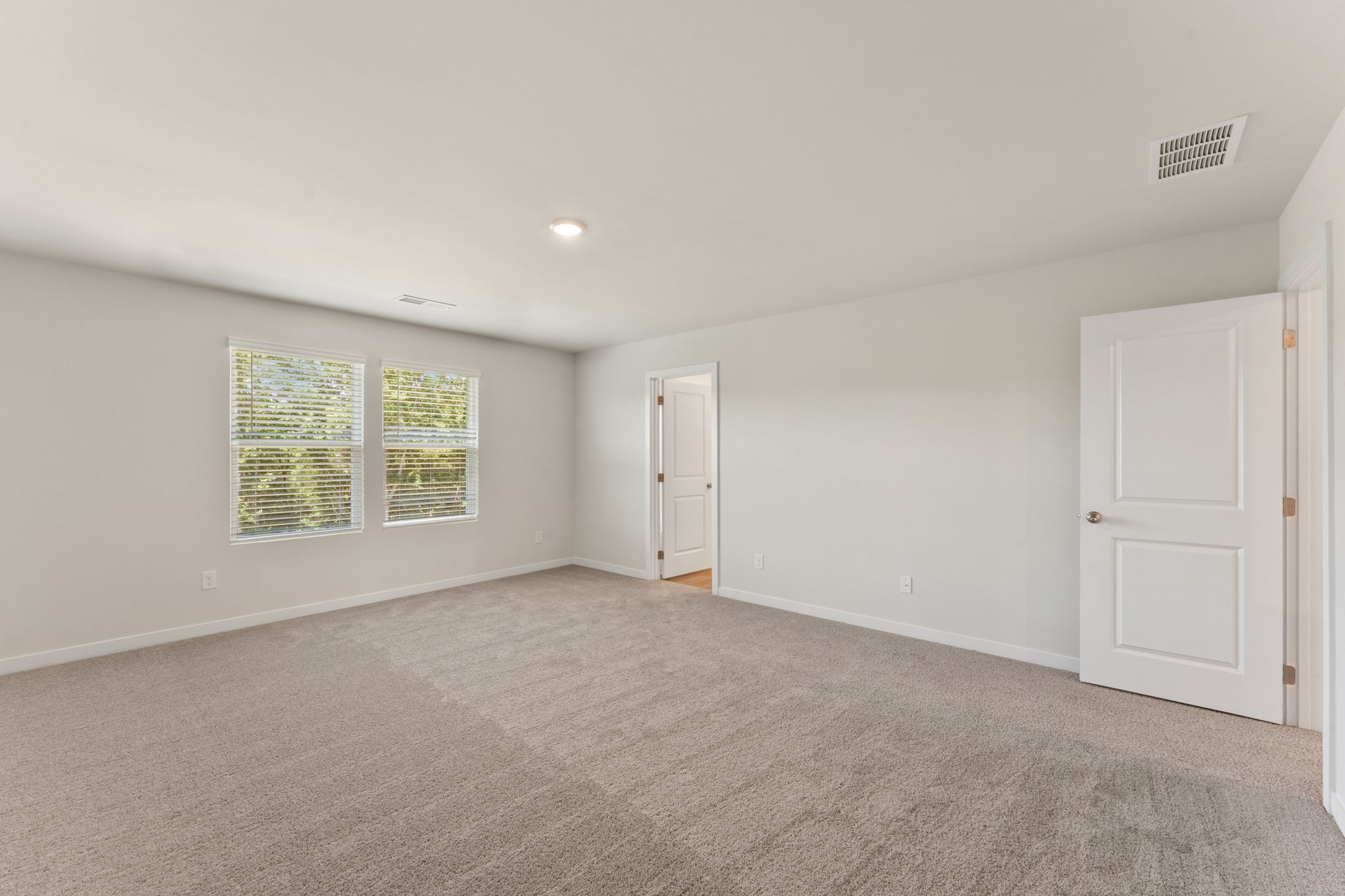 A room with white doors.