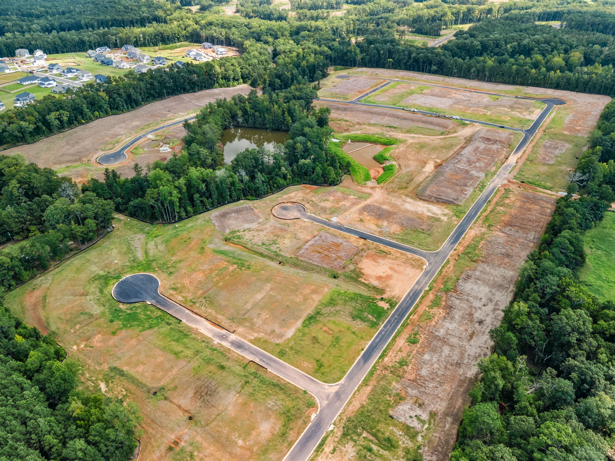 A road with a large pipe.