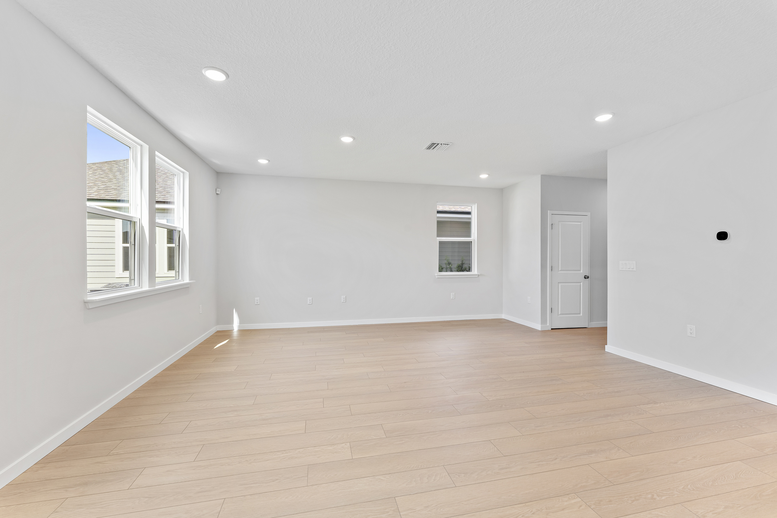 Lot 20 Ponderosa II Dining Area Overlooking Living Room at Camden Woods in Kingsland, GA