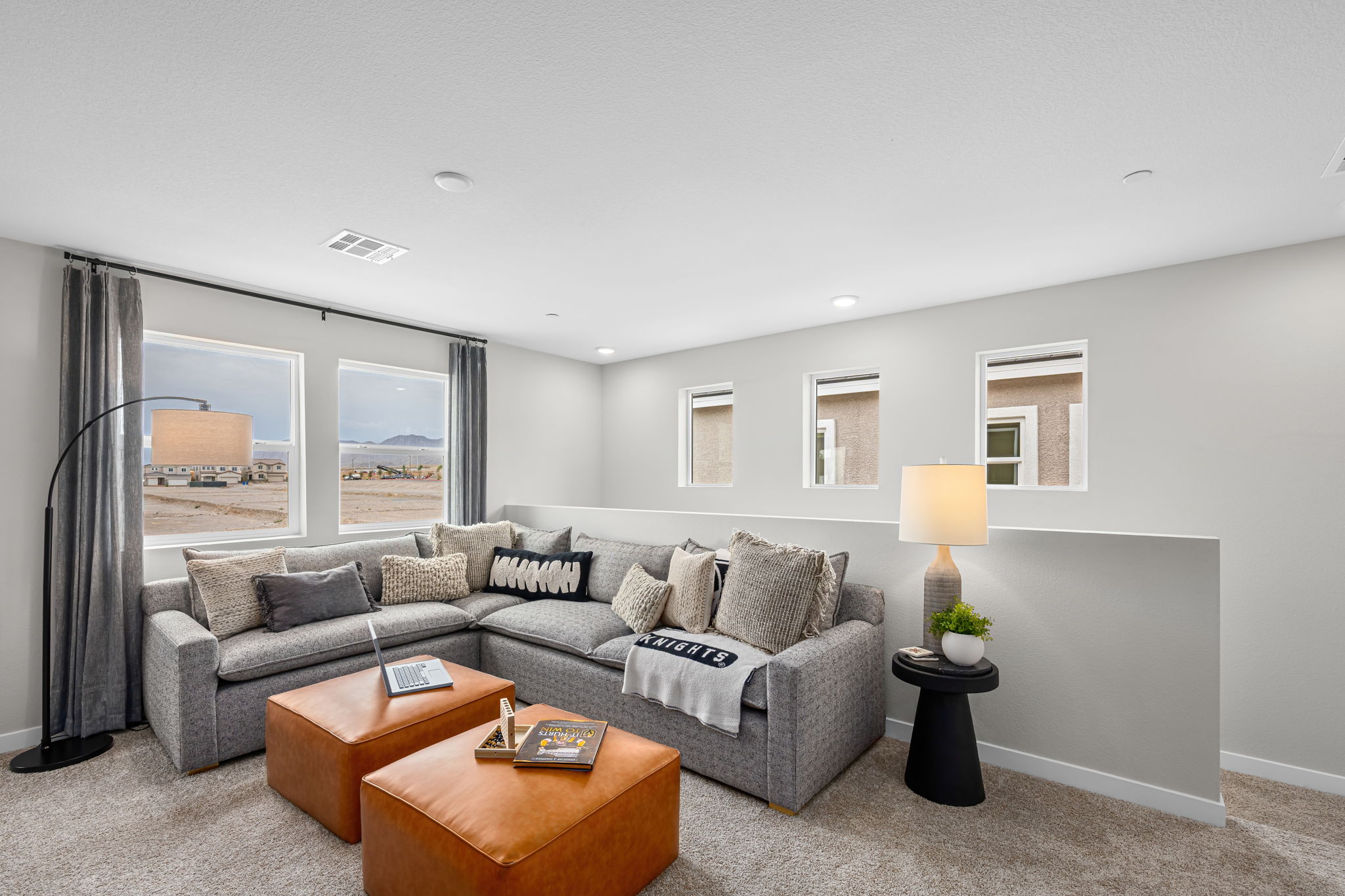 A living room with a couch and a coffee table.