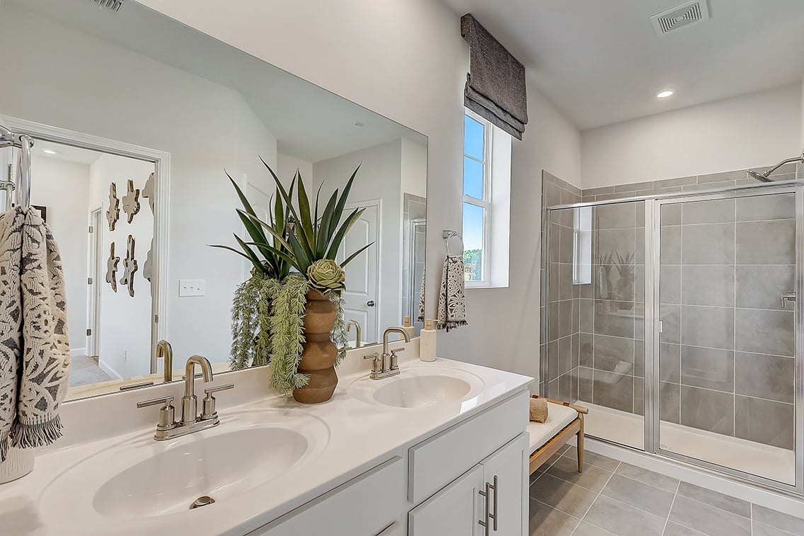 A bathroom with a glass shower.
