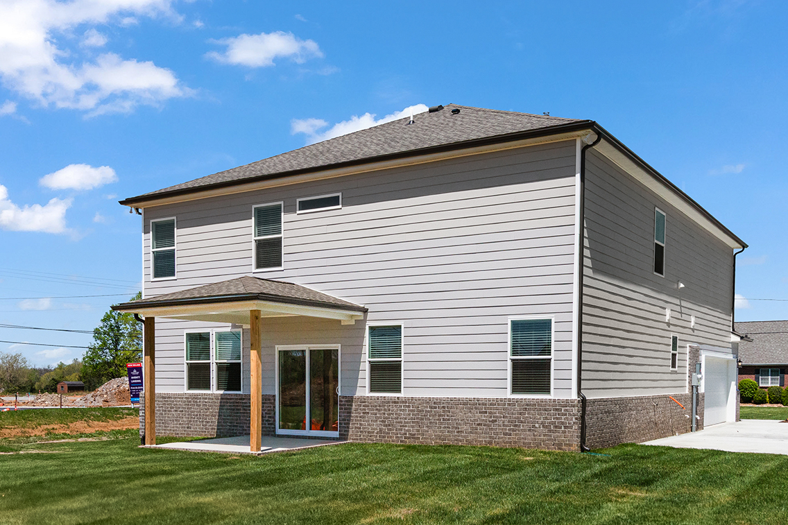 A house with a brick wall.