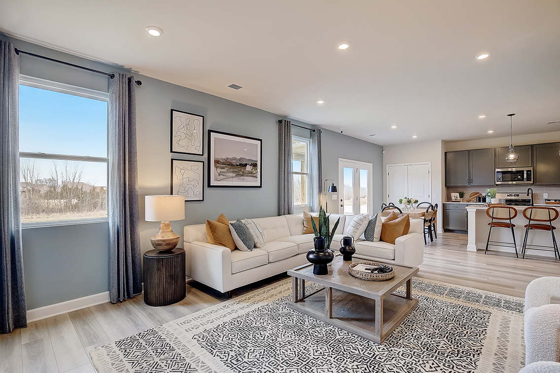 A living room with a large window.