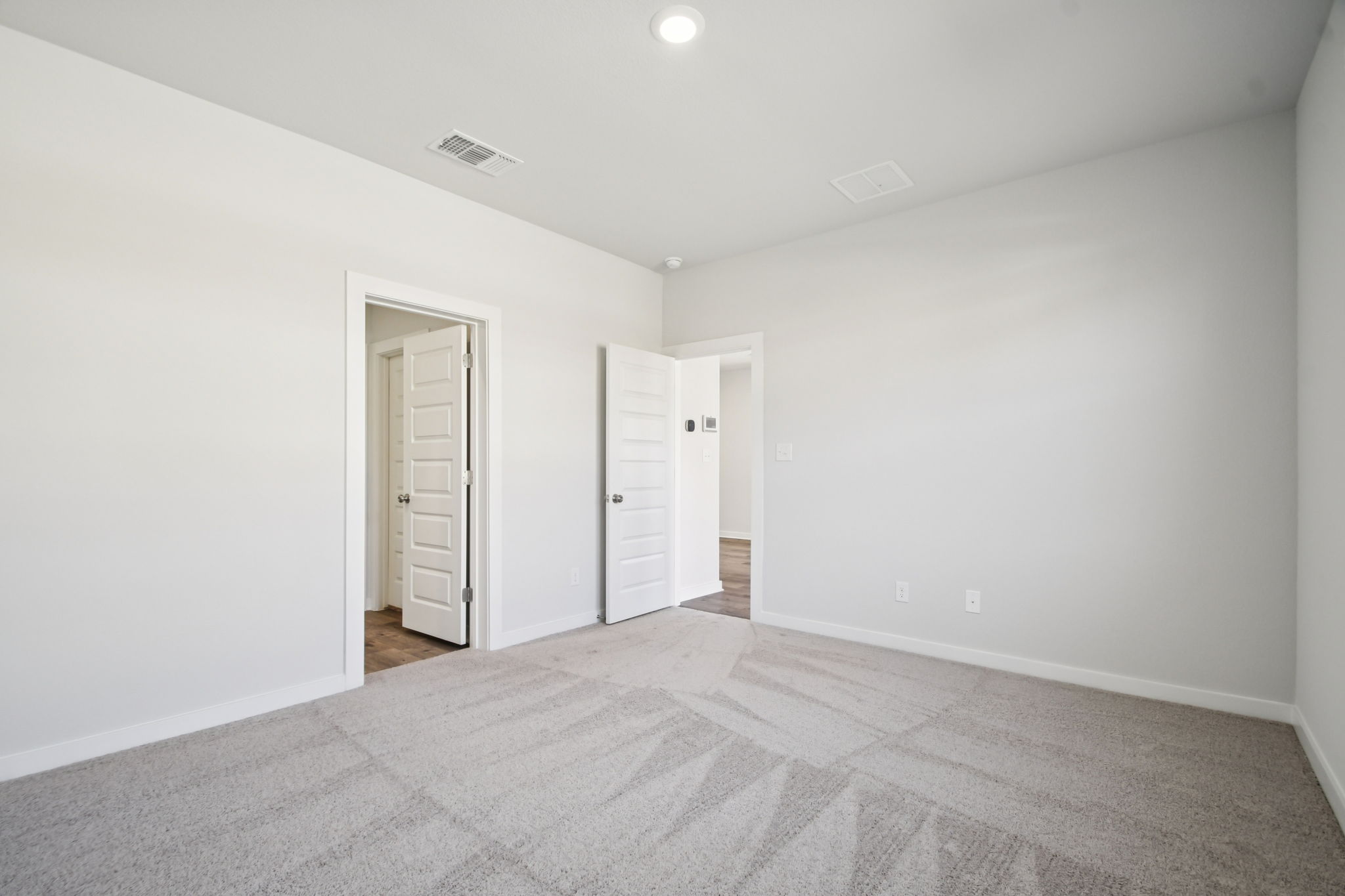 A room with white walls.