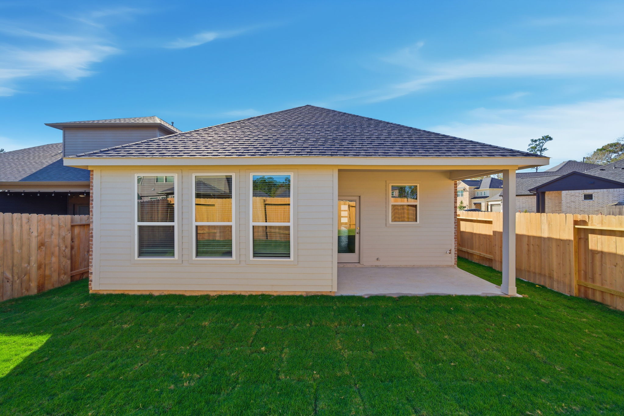 A house with a fence around it.