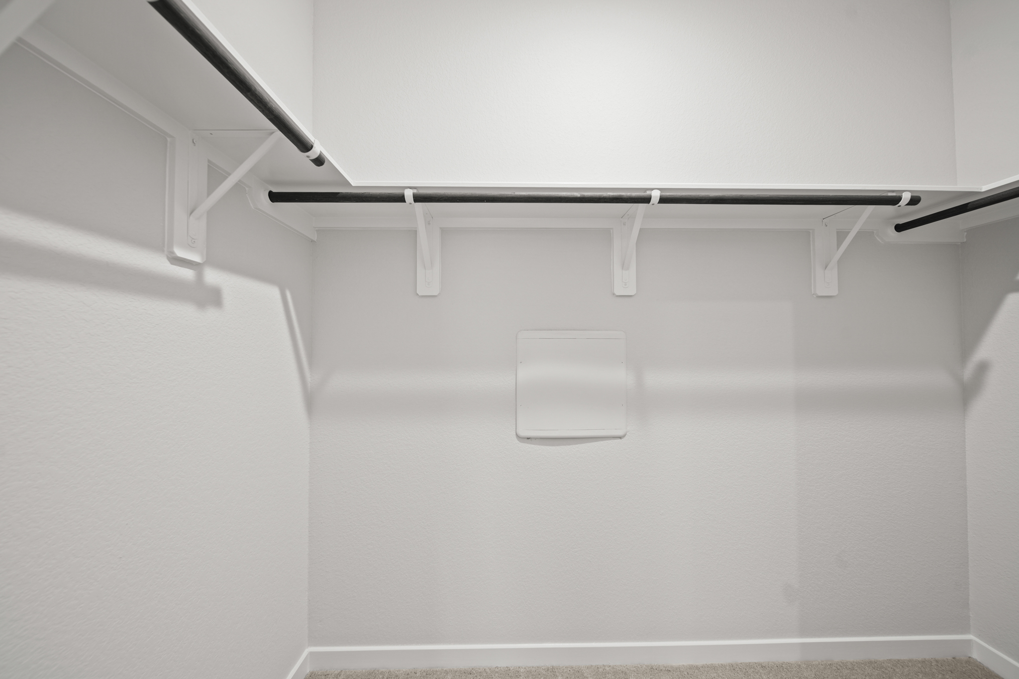 A white ceiling with a light.