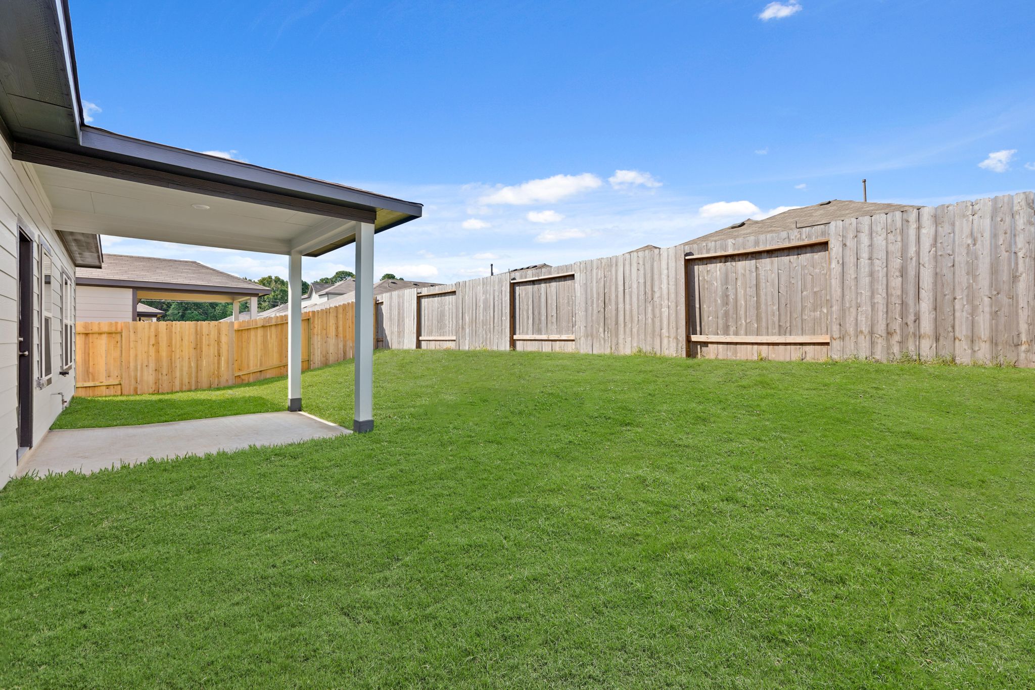A row of wooden buildings.
