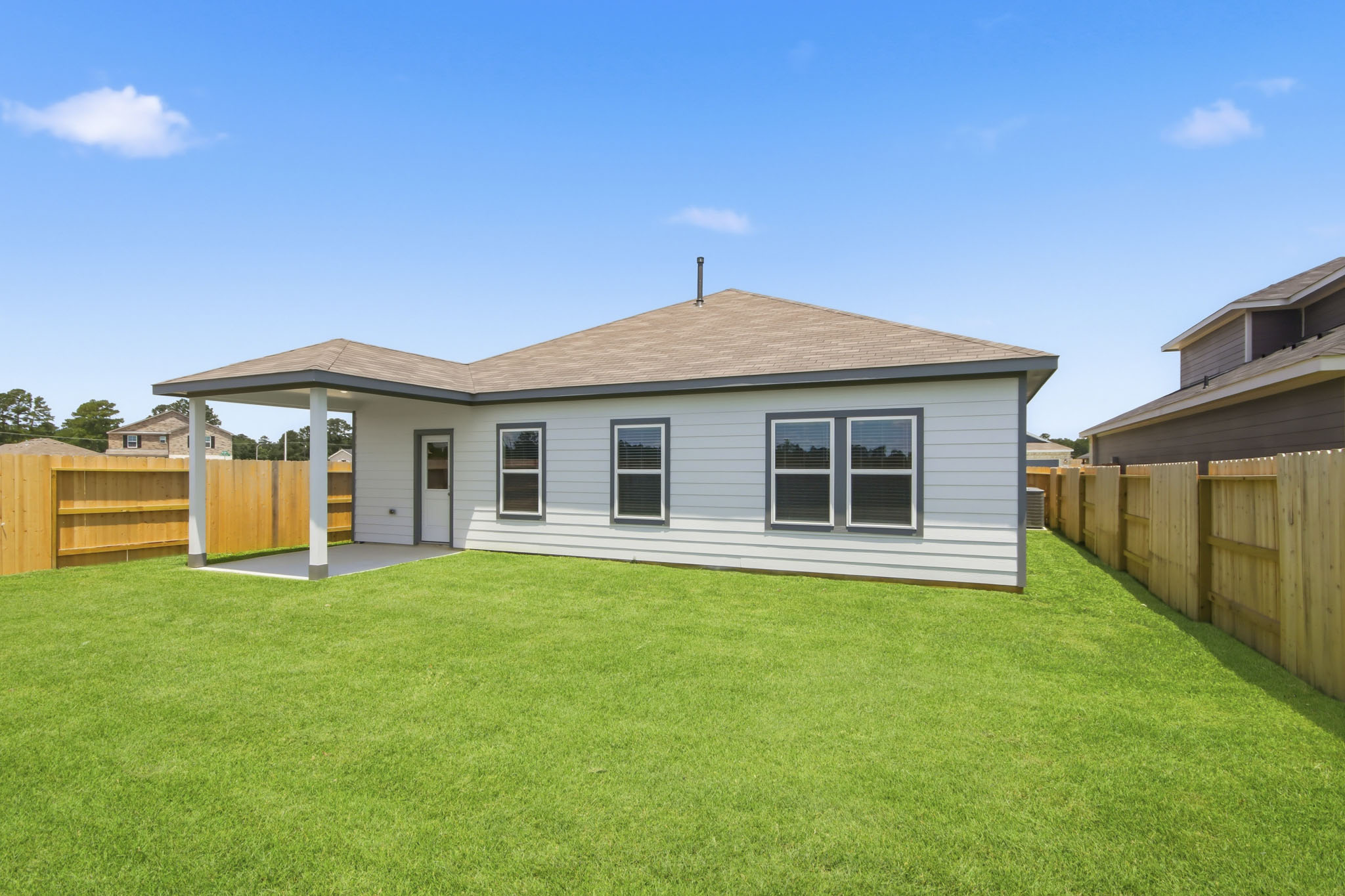 A house with a fence around it.