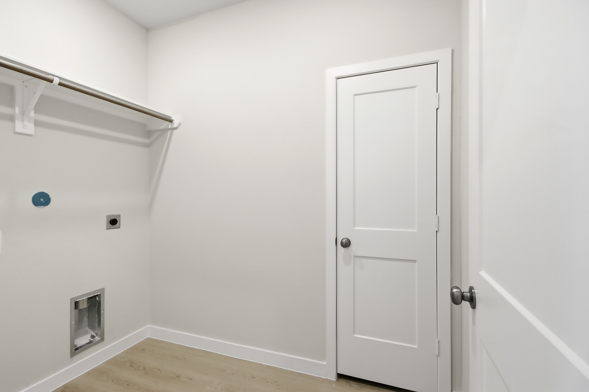 A white door in a room.