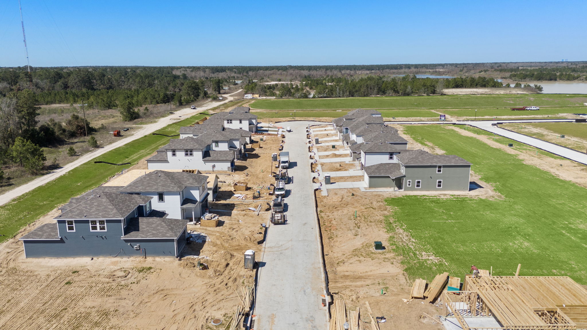 A group of houses in a field.