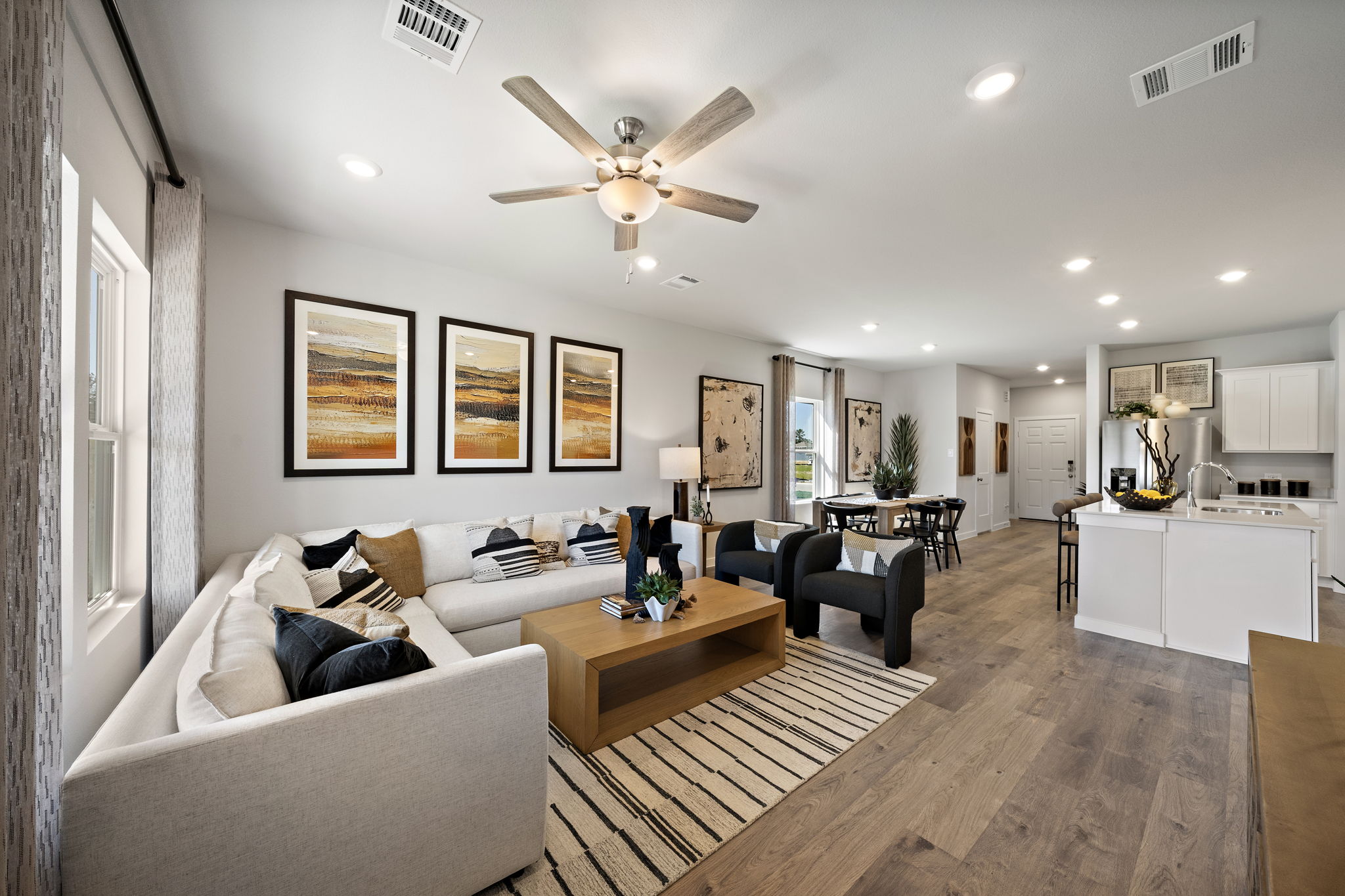 A living room with a fan.
