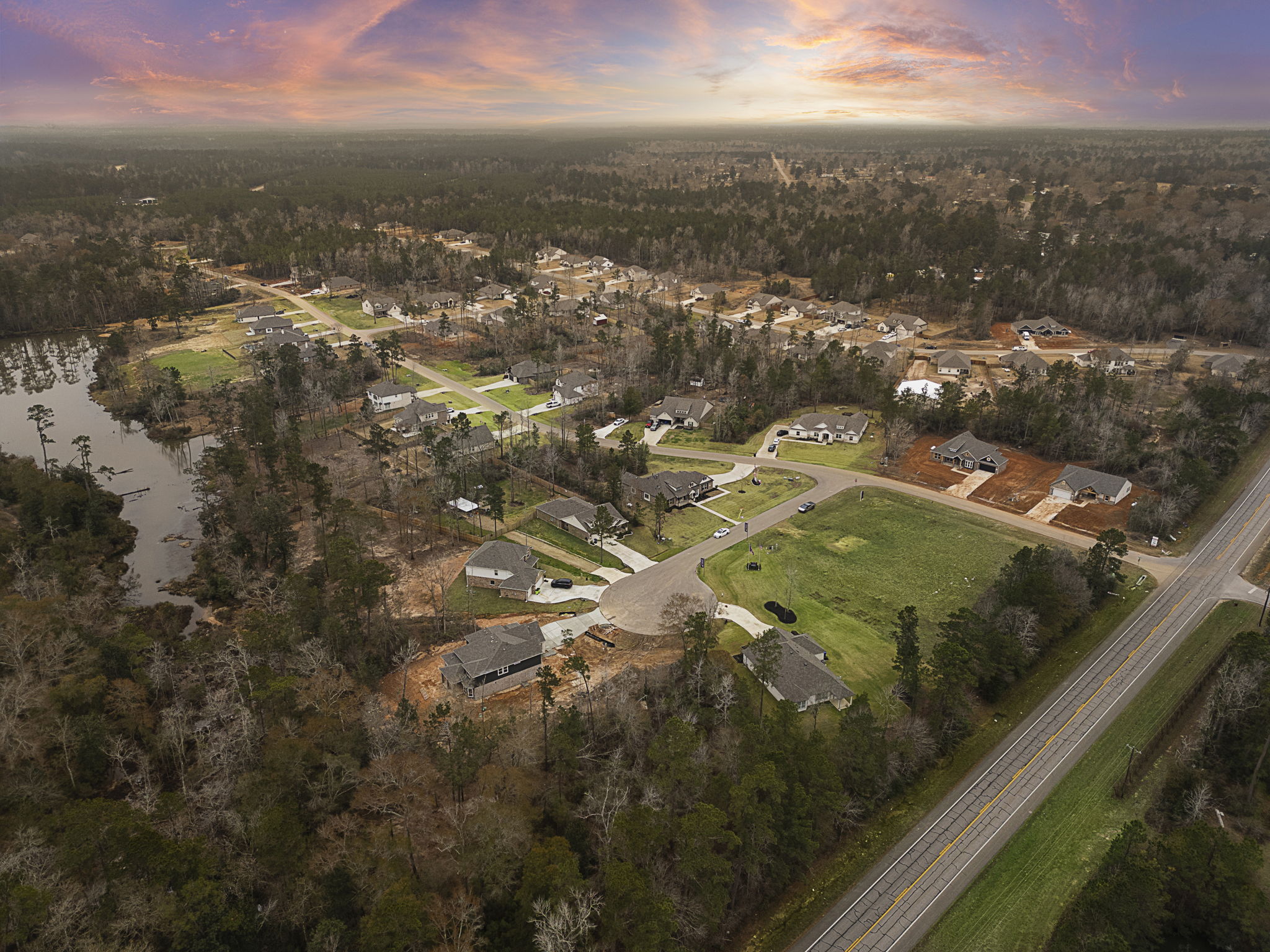 A landscape with houses and trees.