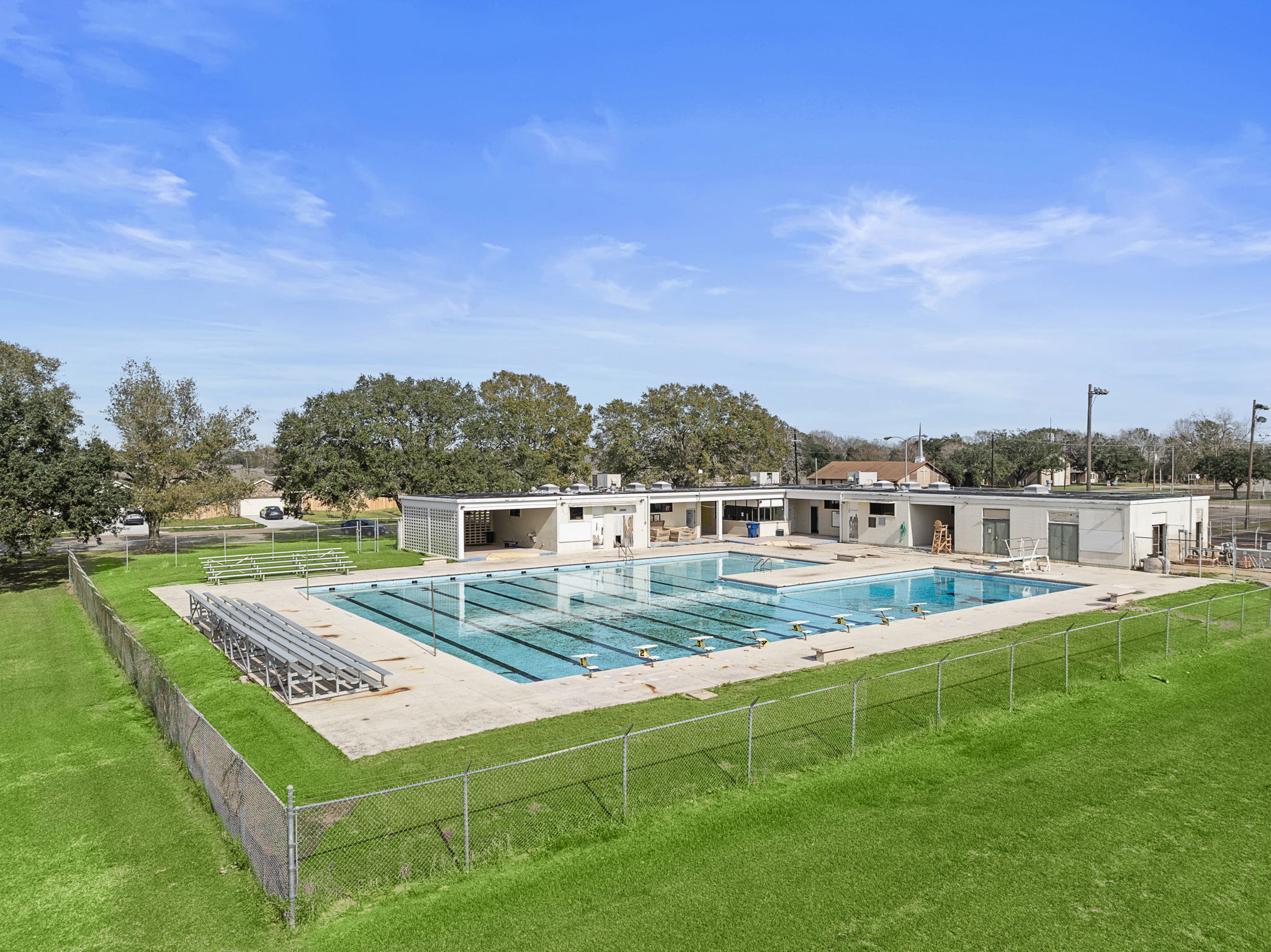 A swimming pool in a backyard.