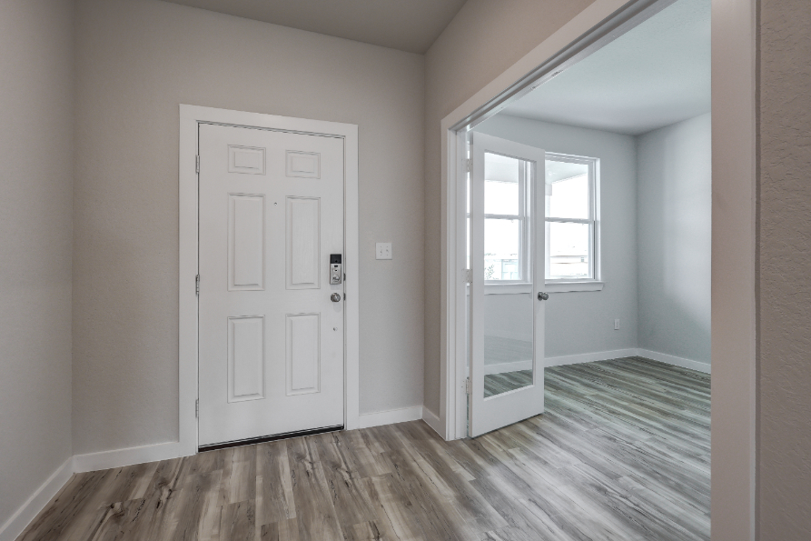 A room with white doors.