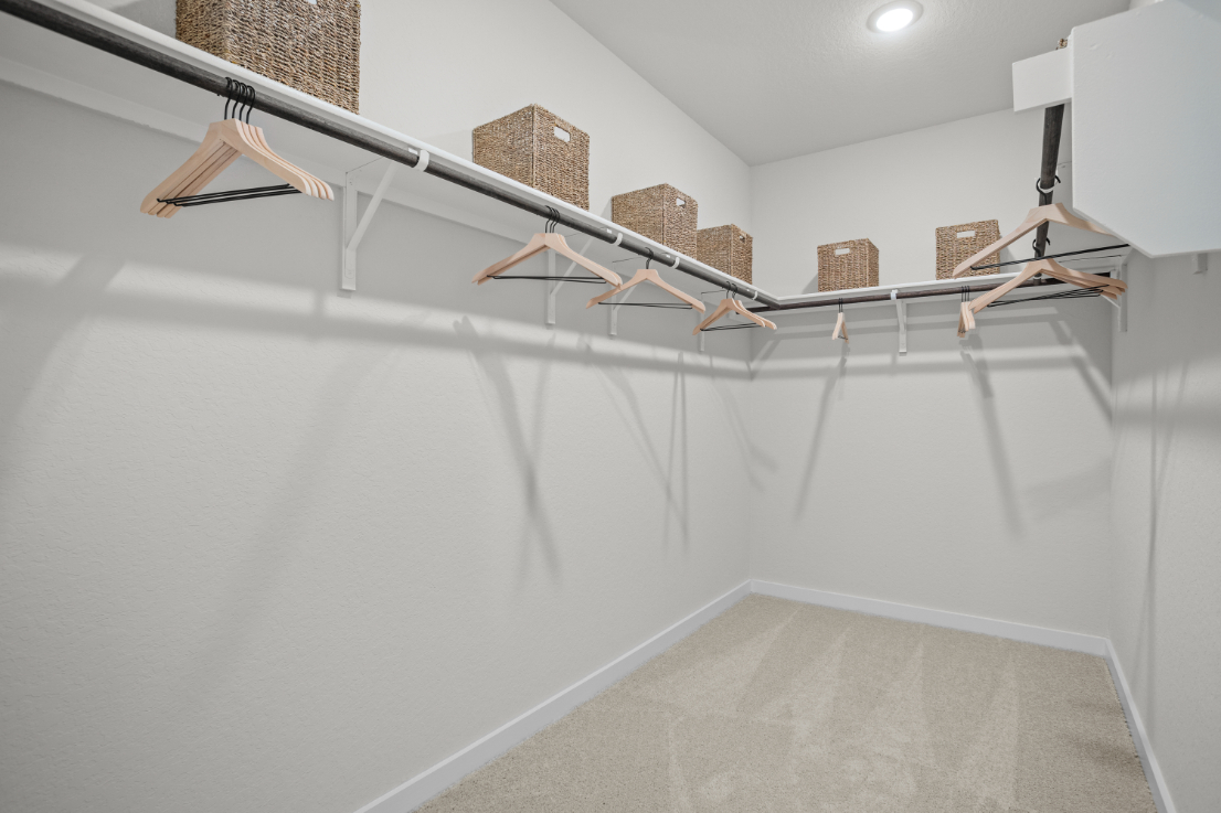 A white wall with a white wall and a white wall with a light.