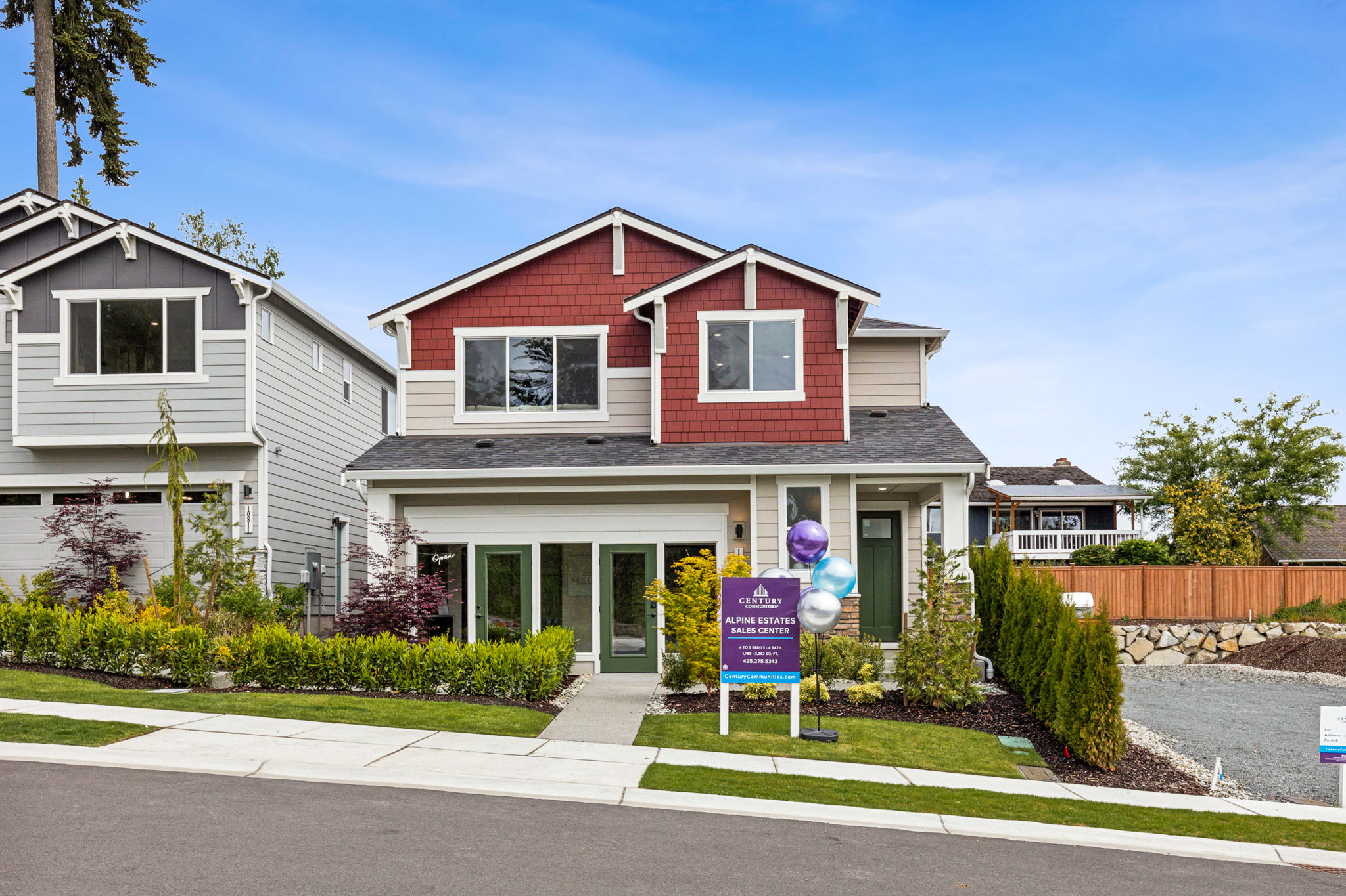 A house with a sign in front.