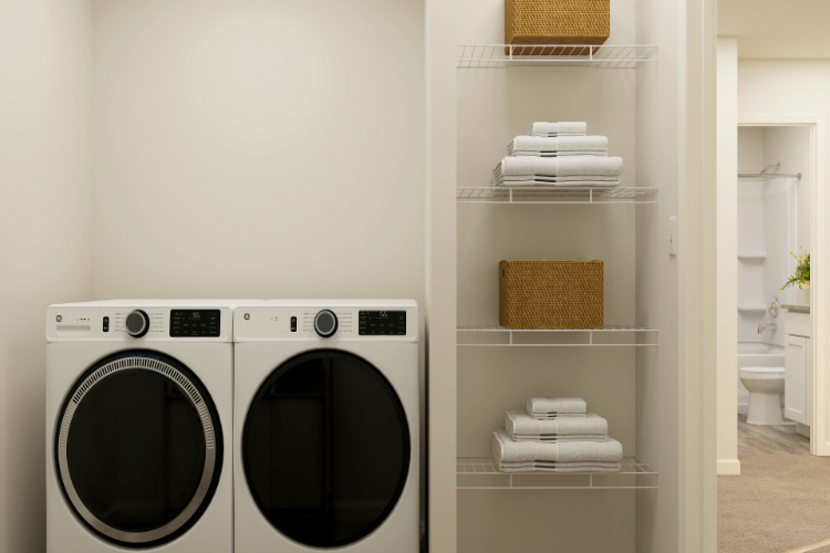 A white laundry room with a white shelf and a white laundry basket.