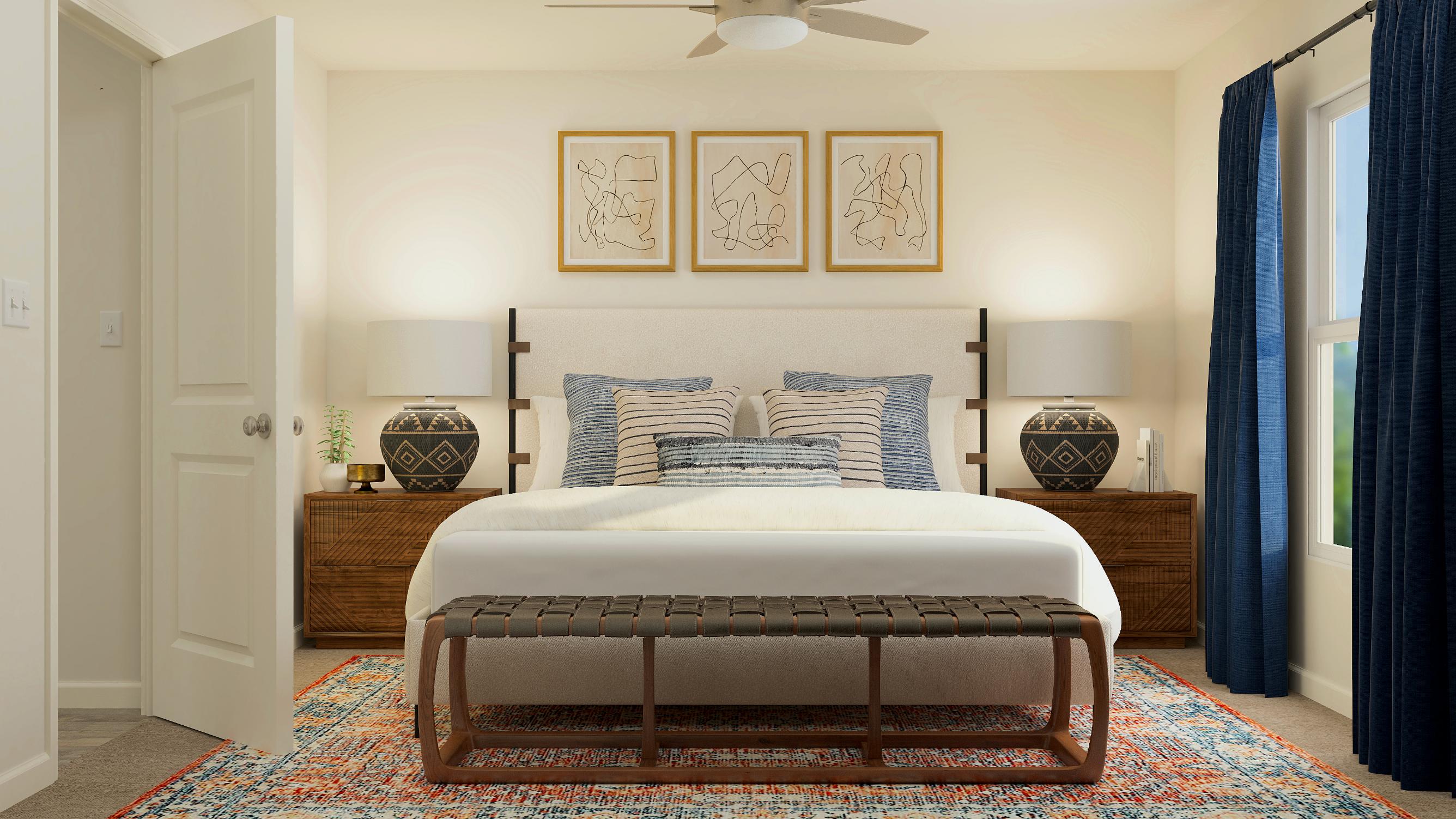 A bedroom with a bed and a table.