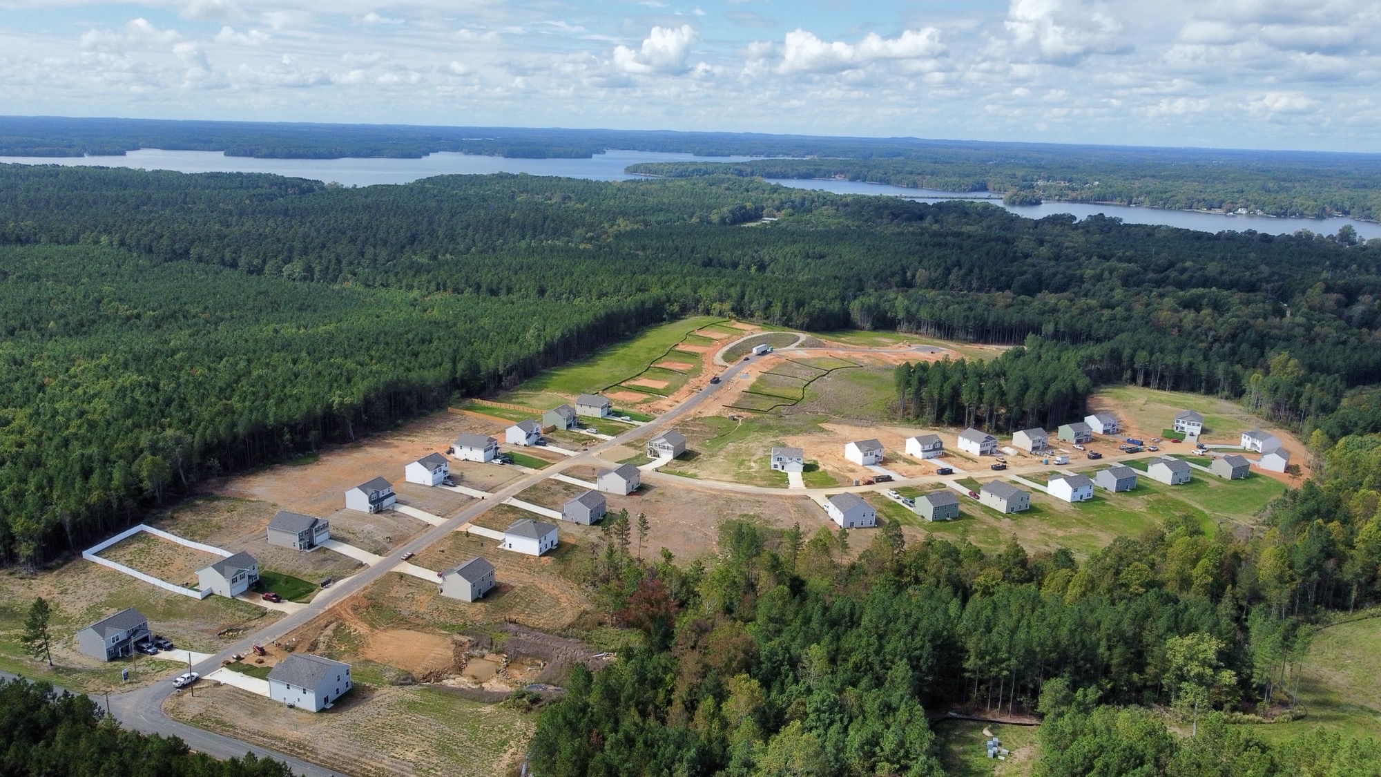 A landscape with houses and trees.