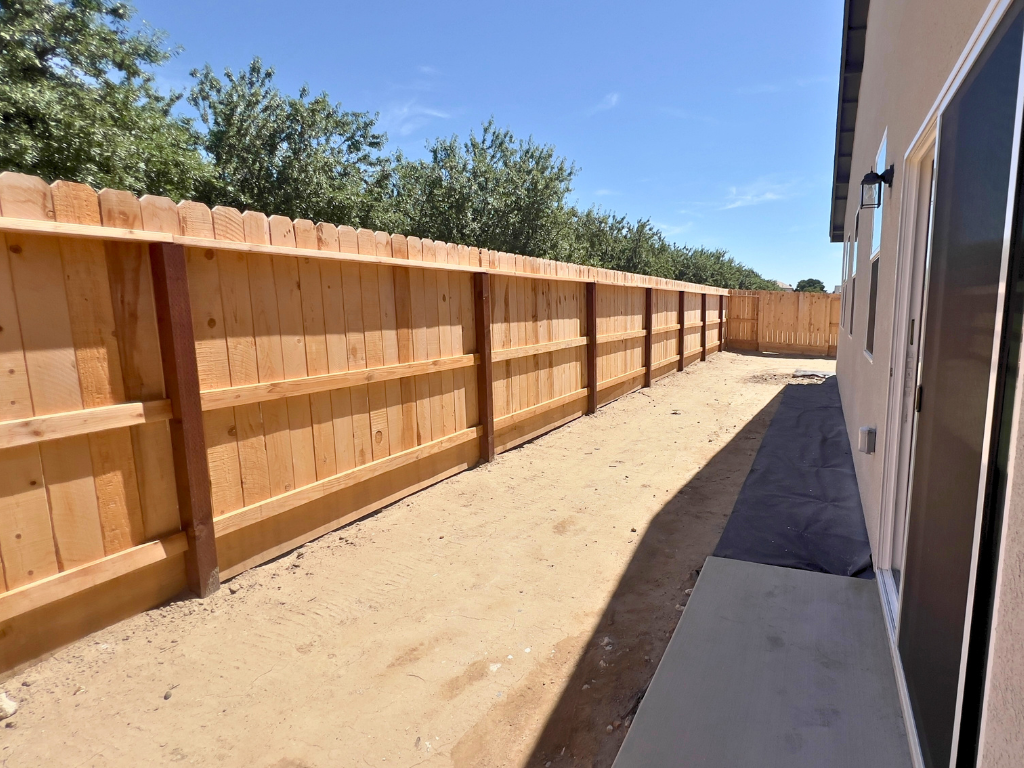 A wooden fence with a wood frame.